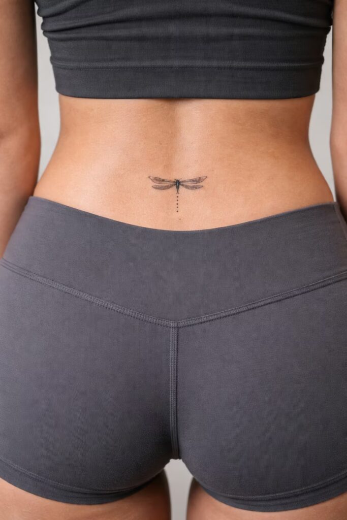 Minimal Dragonfly Tattoo