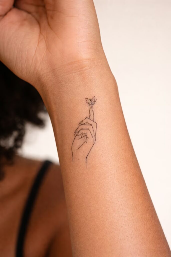 Butterfly Hand Fine Line Tiny Tattoo 