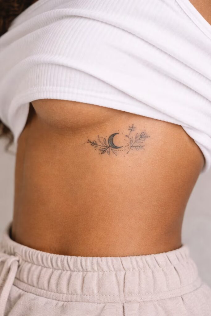 Crescent Moon & Lily Below-Breast Fine Line Tiny Tattoo