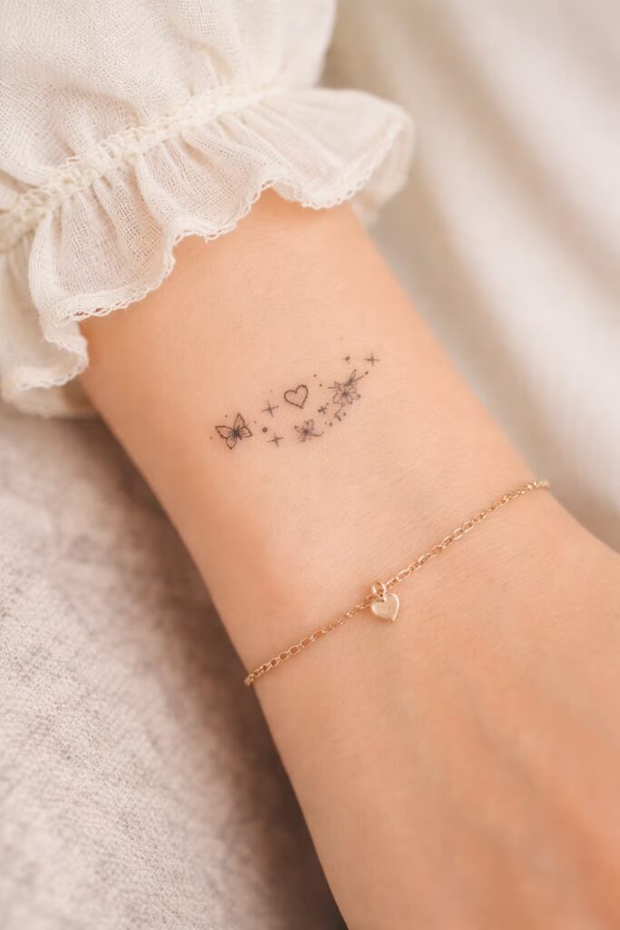 Heart & Butterfly Stars Hand Tattoo 