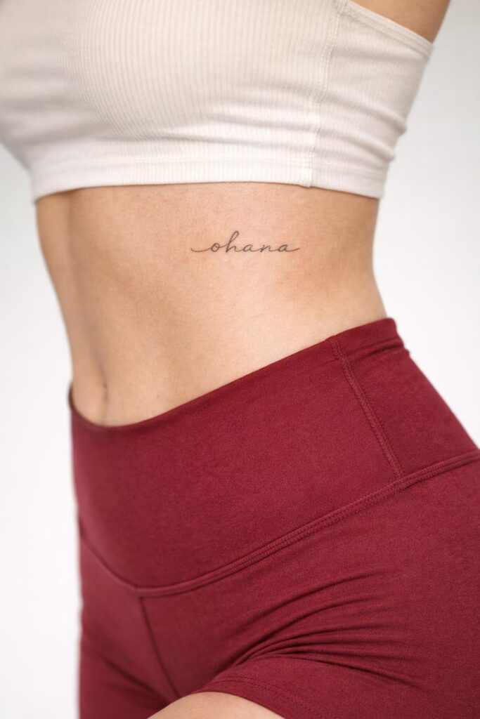 Minimal Script Name Side Tummy Tattoo for Women