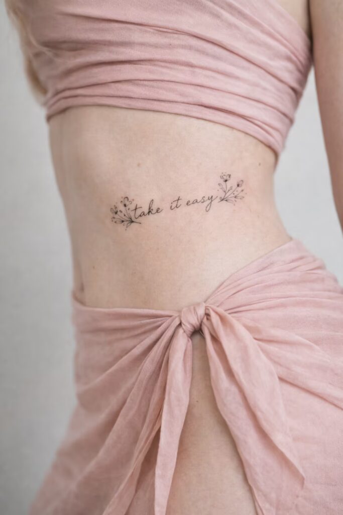 “Take It Easy” Wildflower Script Side Tummy Tattoo for Women