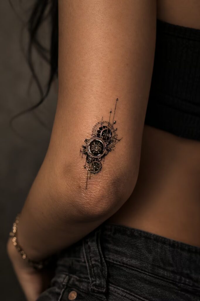 12. Biomechanical Mechanical Gears Upper Arm Tattoo