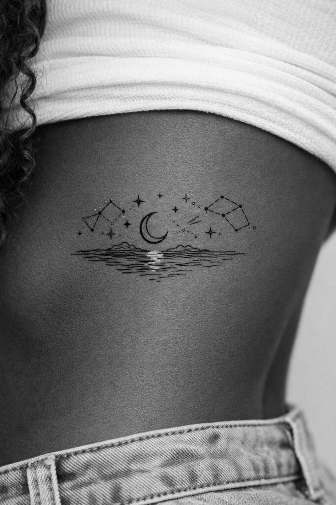 7. Moonlit Ocean Celestial Tattoo