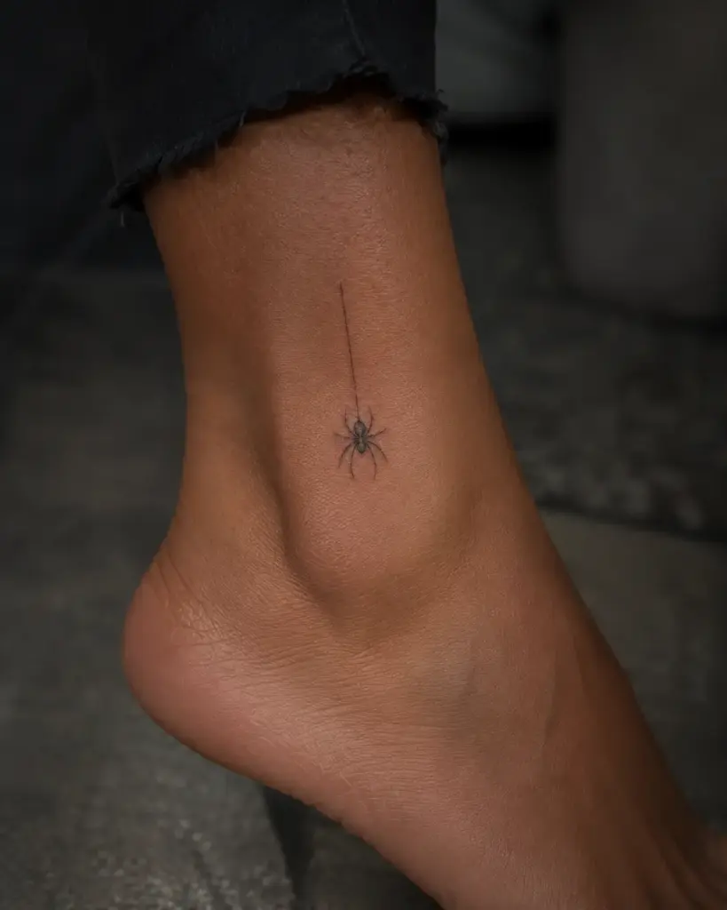 Dangling Thread Ankle Spider Tattoo