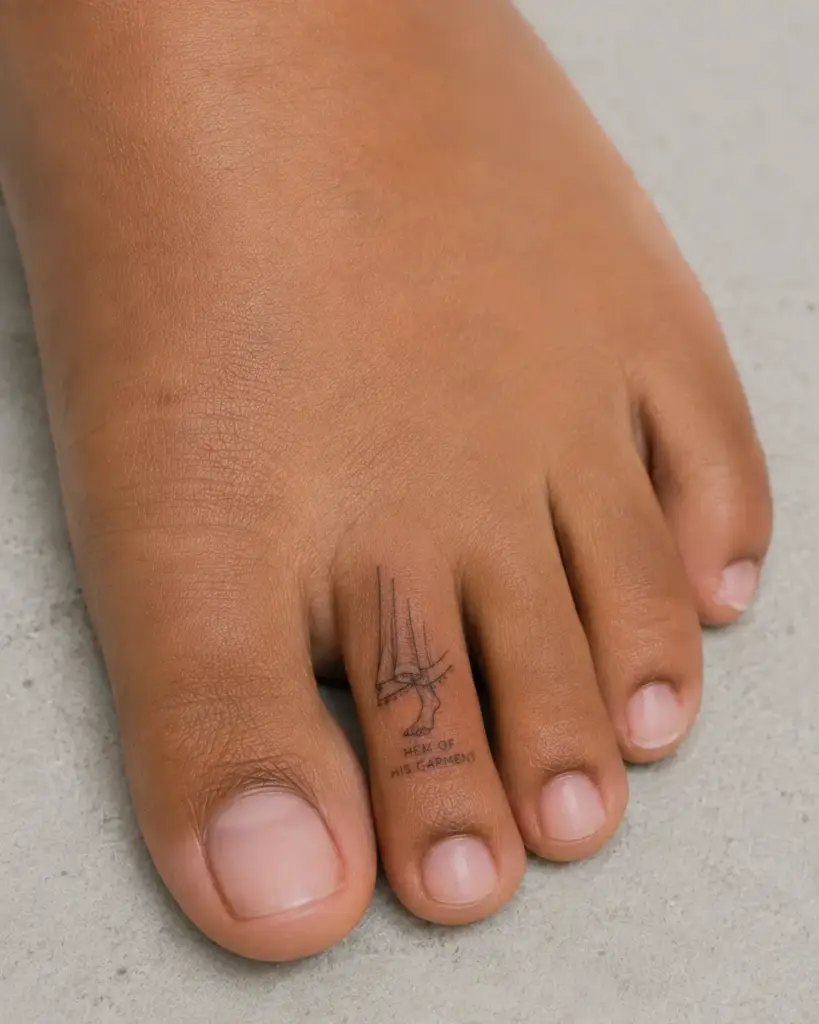 Hem Of His Garment Toe Tattoo