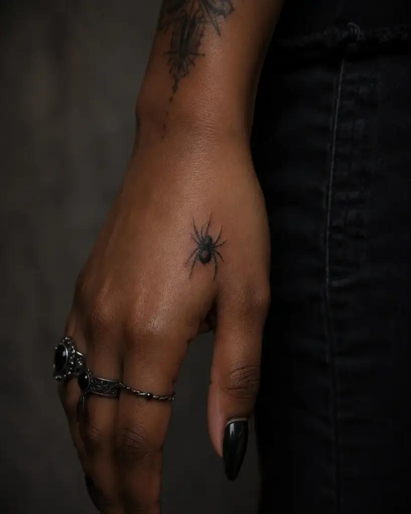 Micro Black Widow Hand Spider Tattoo